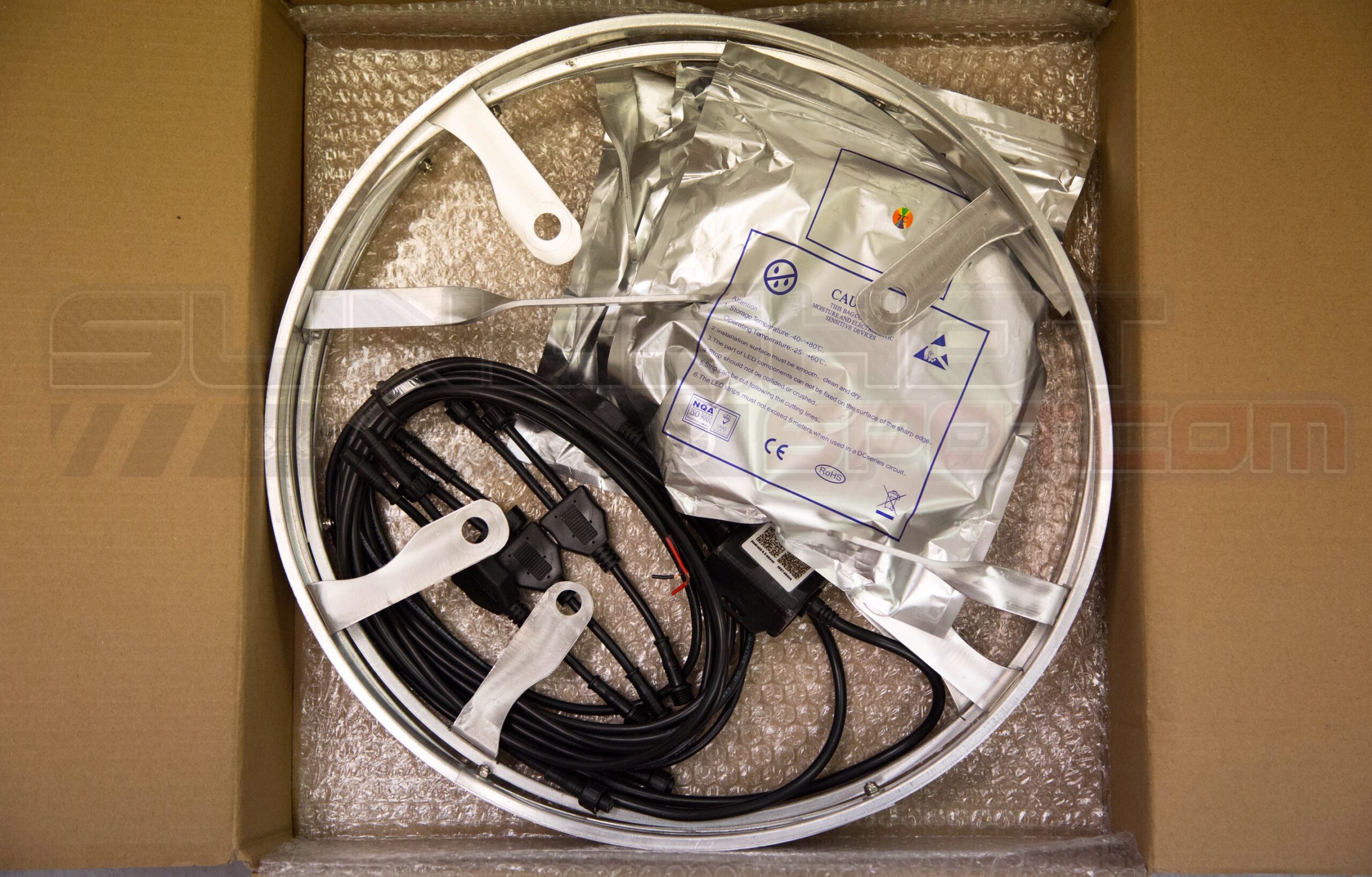 A Box Packed With Icy Wheel Lights