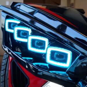 Square Shaped Blue Color Lights on the Front of a Bike