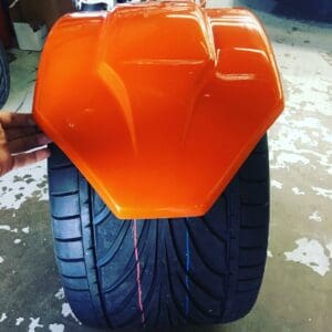 A tire that is sitting on the ground.