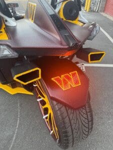 Customized motorcycle with red and yellow design.